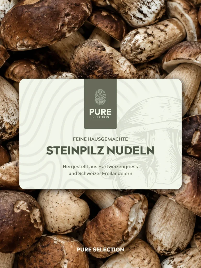 Etikett der Steinpilz Nudeln von Pure Selection auf frischen Steinpilzen